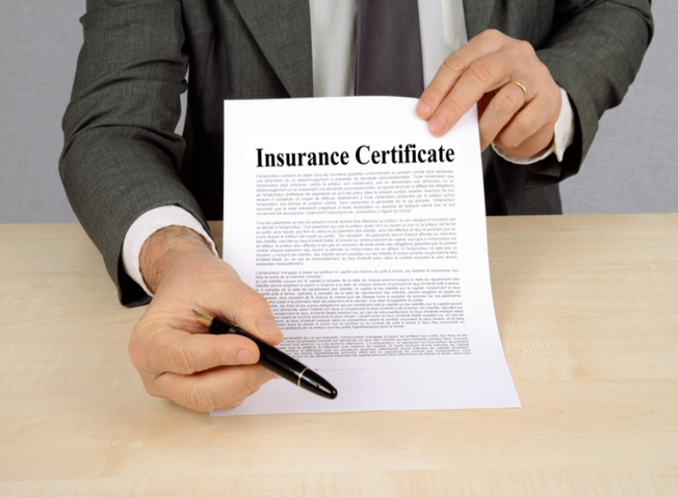 Insurance certificate form outlining policyholder details and coverage specifics in Natick, MA