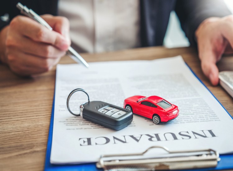 Car loan agreement document with financial terms and vehicle details in Natick, MA